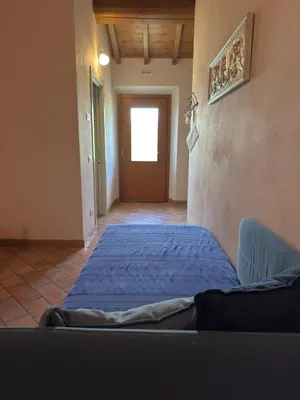 Letto o letti in una camera di Agriturismo Il Filare