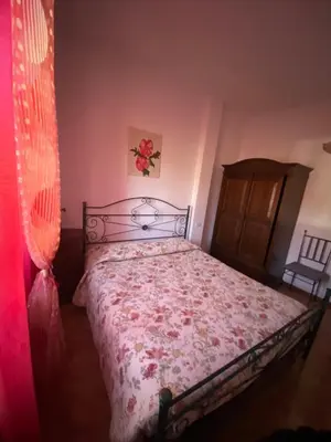 Letto o letti in una camera di Albergo Bar Ristorante Vecchio Mulino