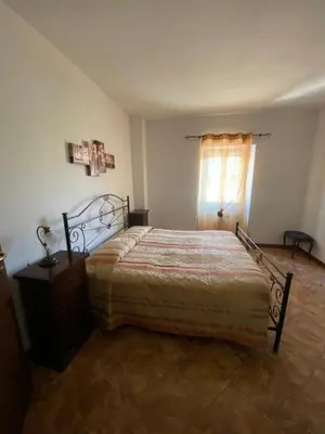 Letto o letti in una camera di Albergo Bar Ristorante Vecchio Mulino