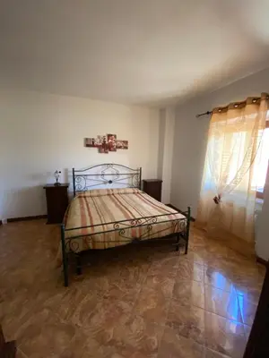 Letto o letti in una camera di Albergo Bar Ristorante Vecchio Mulino