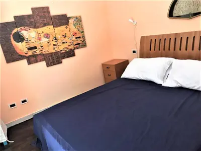 Letto o letti in una camera di SergioHome