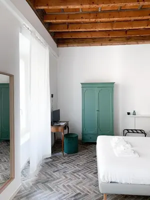 Letto o letti in una camera di Residenza Giulio Romano