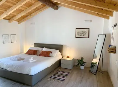 Letto o letti in una camera di Residenza Giulio Romano