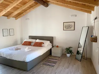 Letto o letti in una camera di Residenza Giulio Romano