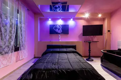 Letto o letti in una camera di Afrodite IdroSuite
