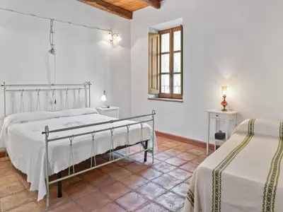 Letto o letti in una camera di Flat with heated hot tub and shared pool
