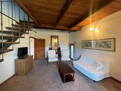 TV o dispositivi per l'intrattenimento presso Flat with heated hot tub and shared pool