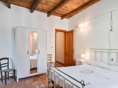 Letto o letti in una camera di Flat with heated hot tub and shared pool