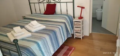 Letto o letti in una camera di B&b Campus