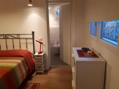 Letto o letti in una camera di B&b Campus