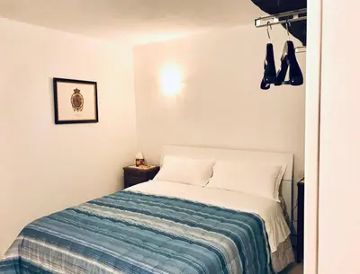 Letto o letti in una camera di [Storico] Ombelico di Parma
