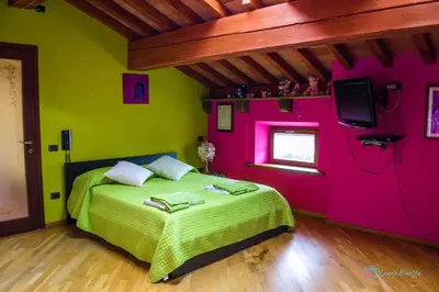 Letto o letti in una camera di Antiche Vie B&B