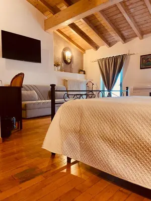 Letto o letti in una camera di La Casina