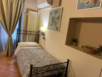 Letto o letti in una camera di La Casina