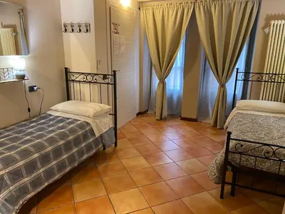 Letto o letti in una camera di La Casina