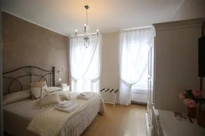 Letto o letti in una camera di Affittacamere in Piazzetta