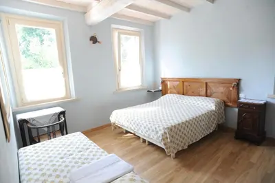 Letto o letti in una camera di Il Giardino Del Conte Custoza