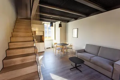 Area soggiorno di Palazzo Le Poste - Suite and Apartments