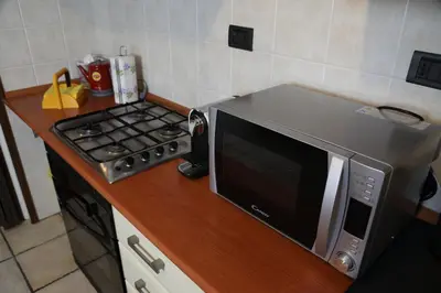 Cucina o angolo cottura di LA DIMORA DEGLI ELFI casa vacanza