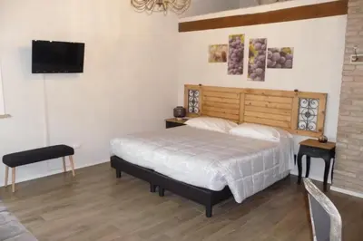 Letto o letti in una camera di Antico Podere Emilia
