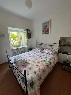 Letto o letti in una camera di VILLA ATRIS