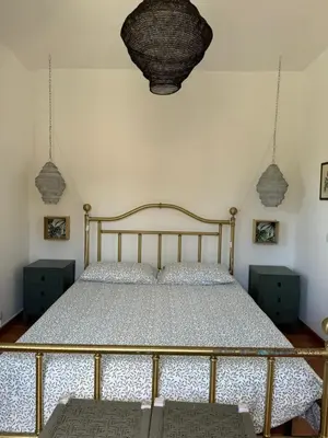 Letto o letti in una camera di VILLA ATRIS