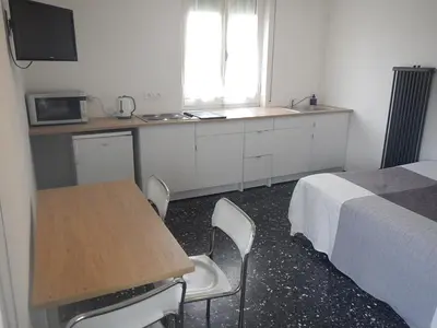 Cucina o angolo cottura di La Pergola Private Parking