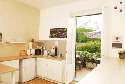Cucina o angolo cottura di La Pergola Private Parking