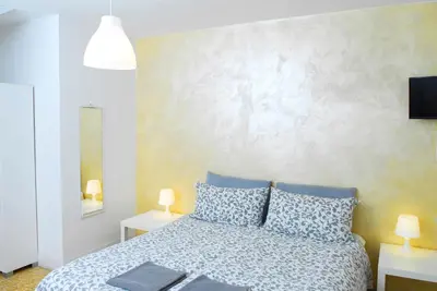 Letto o letti in una camera di La Pergola Private Parking