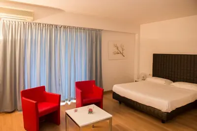 Letto o letti in una camera di Park Hotel Residence