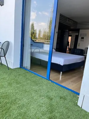 Letto o letti in una camera di Park Hotel Residence