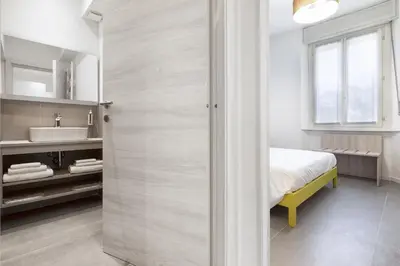 Letto o letti in una camera di b&b Amaca
