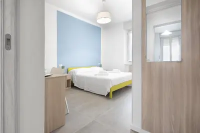Letto o letti in una camera di b&b Amaca