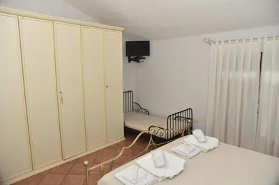 Letto o letti in una camera di Casa Emanuela, Il nostro Nido d'amore