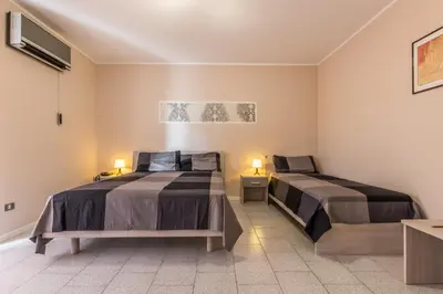 Letto o letti in una camera di Hotel Maris