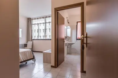 Letto o letti in una camera di Hotel Maris