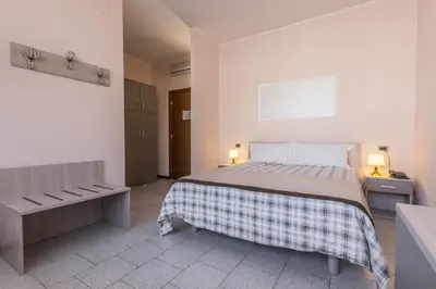 Letto o letti in una camera di Hotel Maris