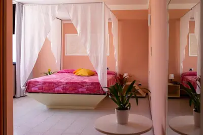 Letto o letti in una camera di Hotel Maris