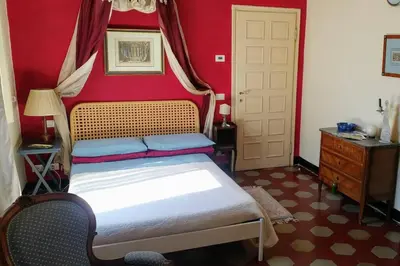 Letto o letti in una camera di Cozy apartment in Palazzo Malaspina