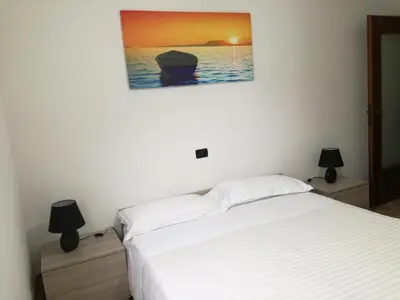 Letto o letti in una camera di Appartamento Mare Blu
