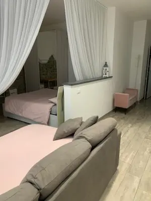 Letto o letti in una camera di Vecchie Mura G