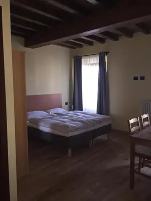 Letto o letti in una camera di Ababo Affittacamere