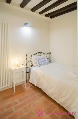 Letto o letti in una camera di FuoriPorta Affitti Brevi - Residenza New Dalmazia 6