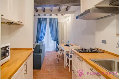 Cucina o angolo cottura di FuoriPorta Affitti Brevi - Residenza New Dalmazia 6