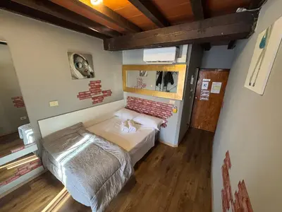 Letto o letti in una camera di Piccola Stella
