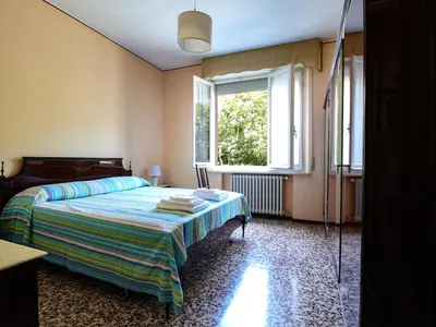 Letto o letti in una camera di Residenza Parco Ducale