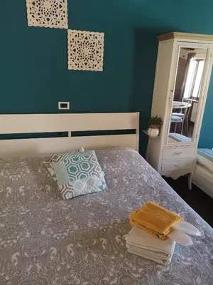 Letto o letti in una camera di Borgo Fiore House
