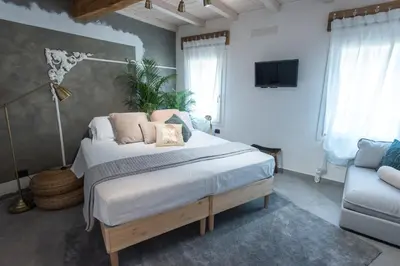 Letto o letti in una camera di Luna Sul Tetto