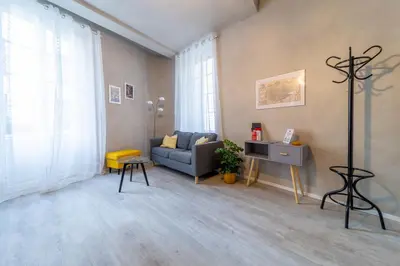 Area soggiorno di Parma Central Apartments