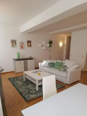 Area soggiorno di Parma Central Apartments